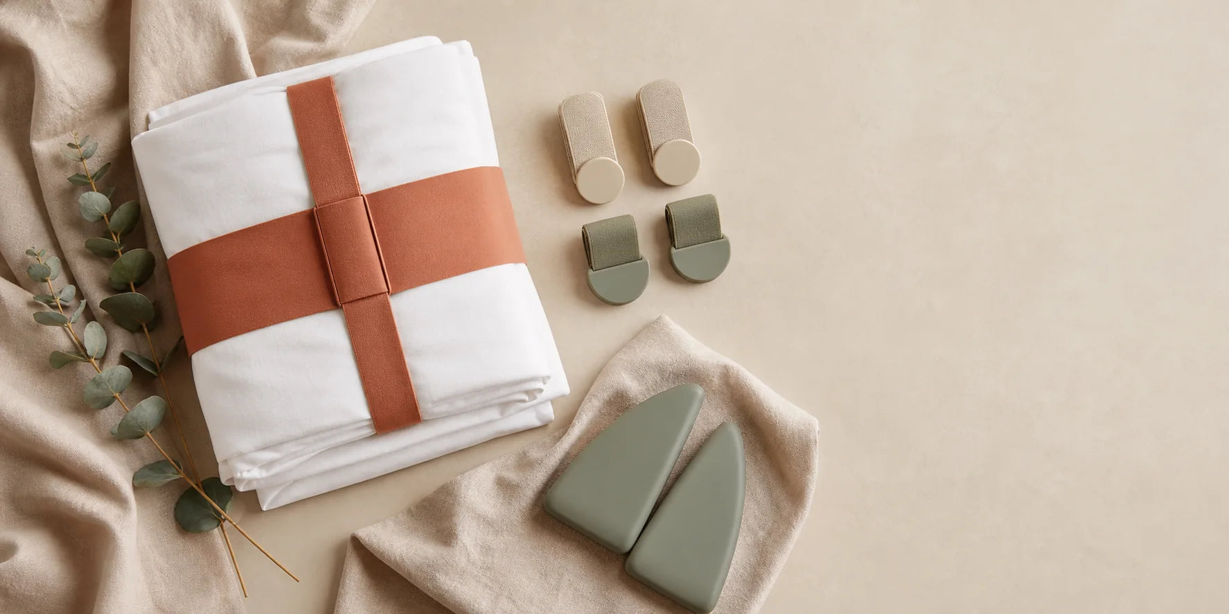 The focused Tuckora collection of mattress lifters and fitted-sheet straps